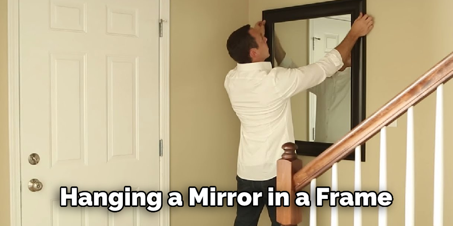 hanging a mirror in a frame
