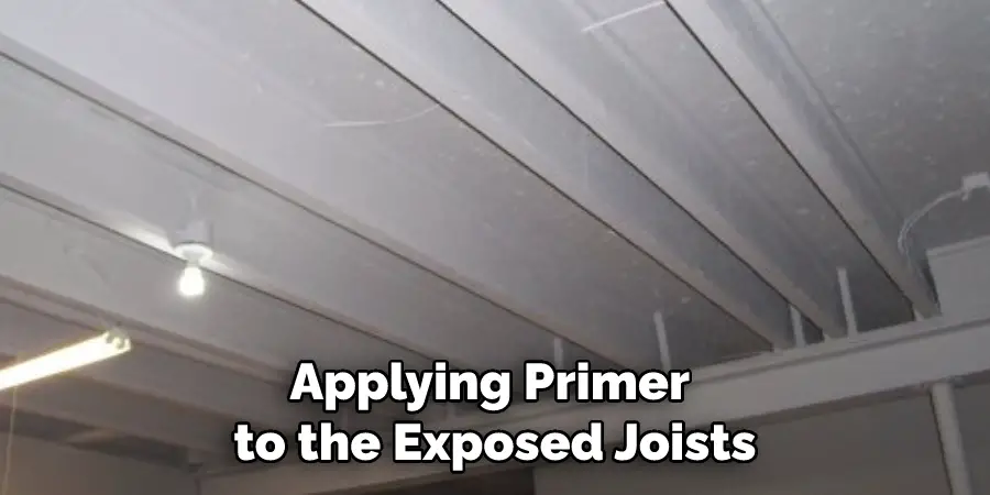 Applying Primer to the Exposed Joists