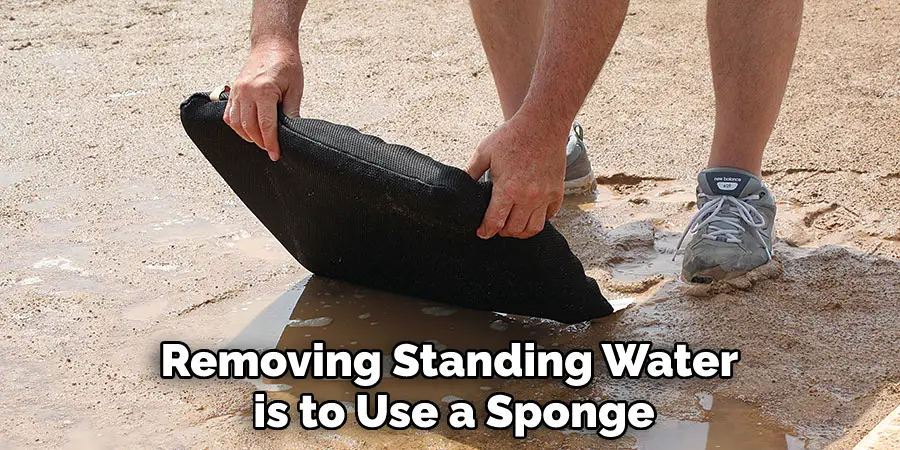 Removing Standing Water is to Use a Sponge