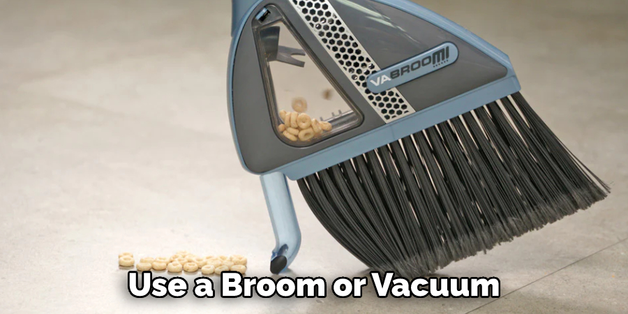 Use a Broom or Vacuum