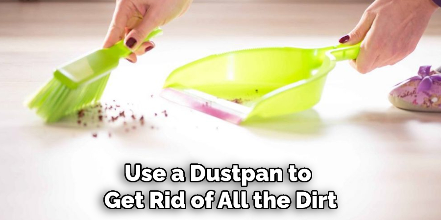 Use a Dustpan to Get Rid of All the Dirt