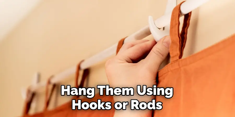 Hang Them Using Hooks or Rods