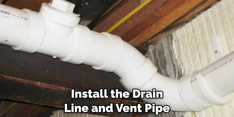 Install the Drain Line and Vent Pipe
