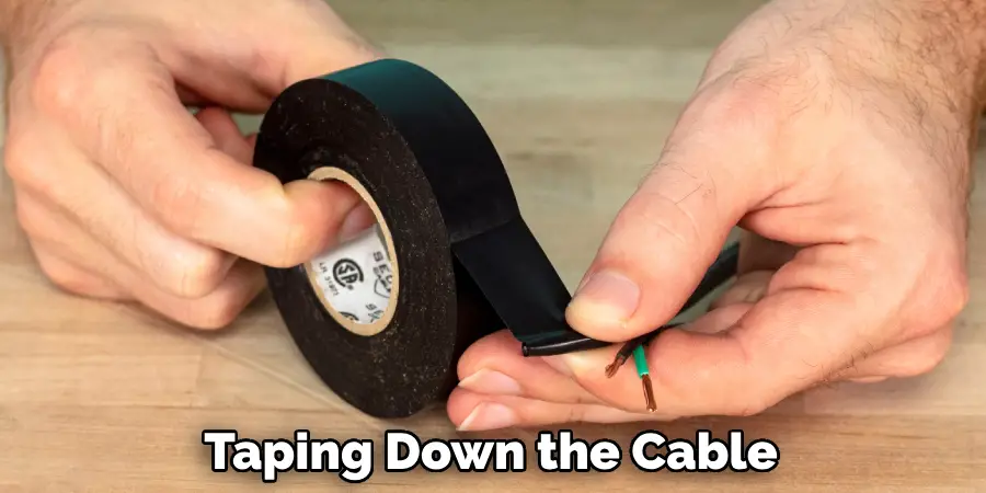 Taping Down the Cable