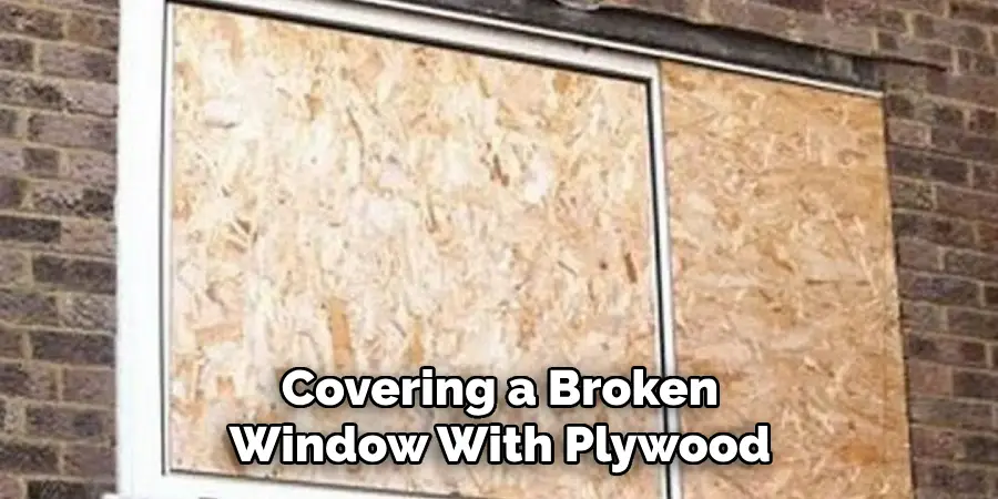 Covering a Broken Window With Plywood