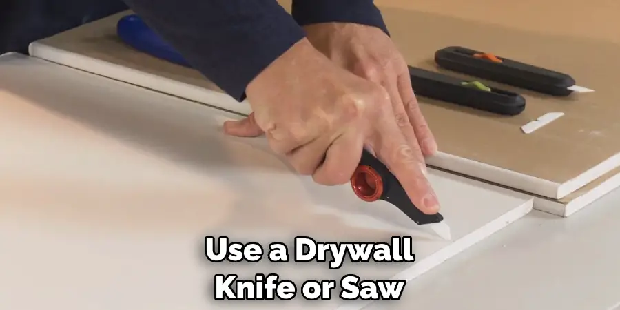 Use a Drywall Knife or Saw